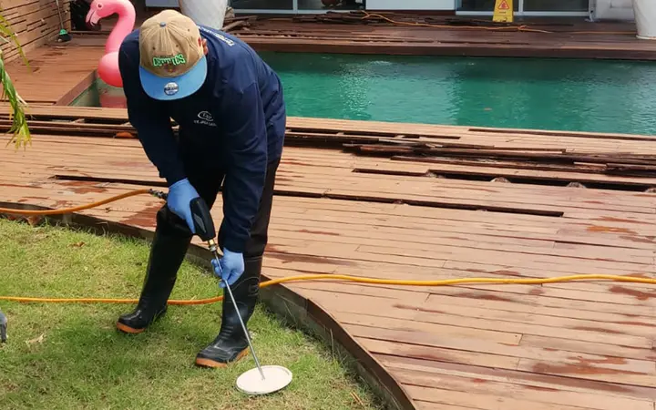 T4P pest control technician treating a property in Bali